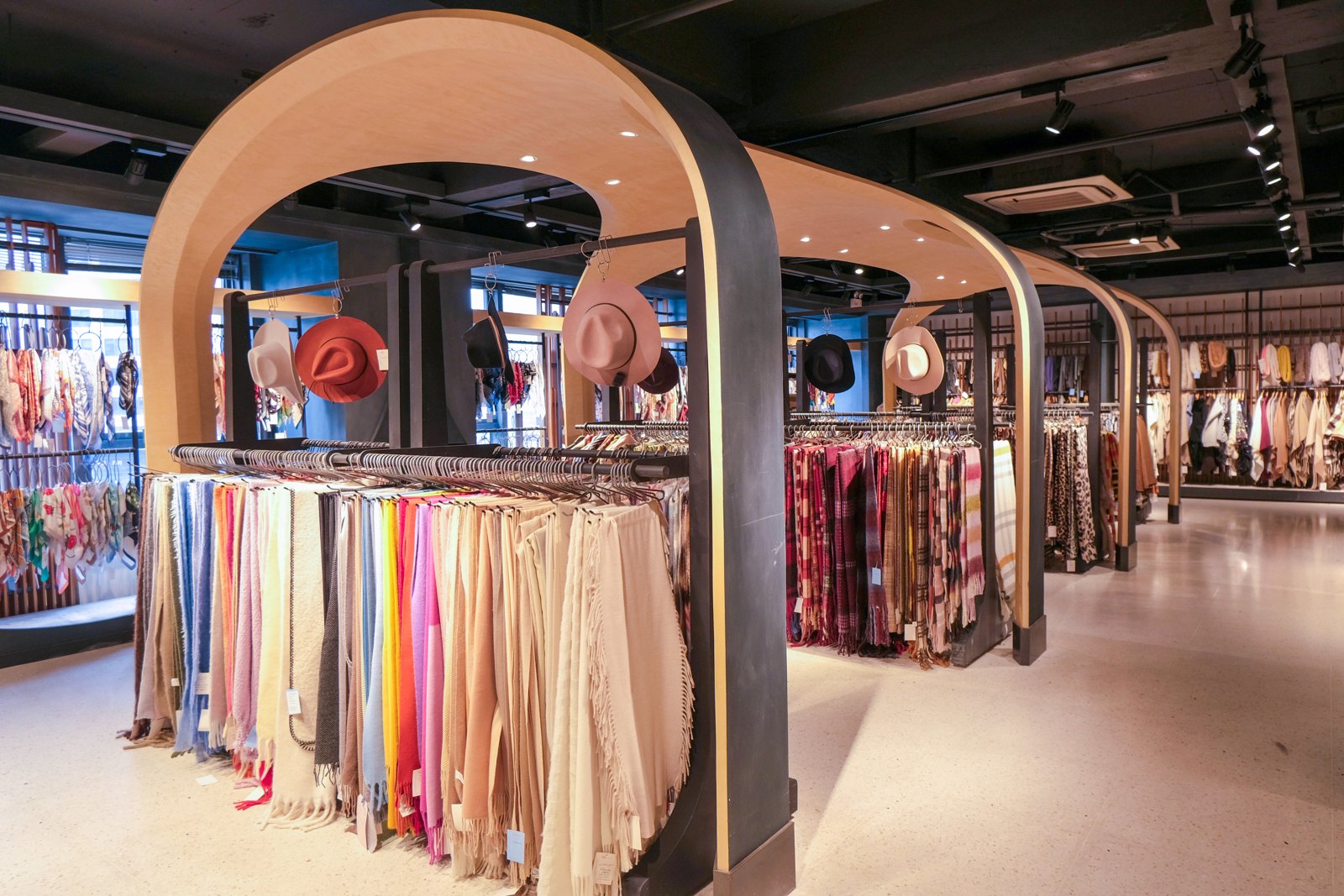 Hangzhou Shunlan showroom — scarves and showroom displays